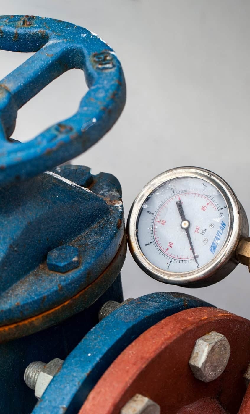 Pressure gauge and blue valve during utility maintenance